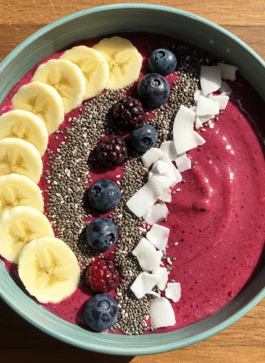 Vibrant smoothie bowl topped with banana, chia, and coconut